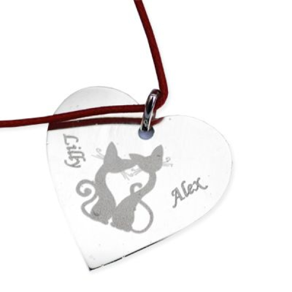 Pendentif coeur en argent avec motifs