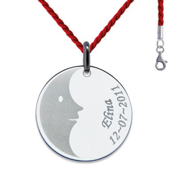 Pendentif rond gravé d'un dessin
