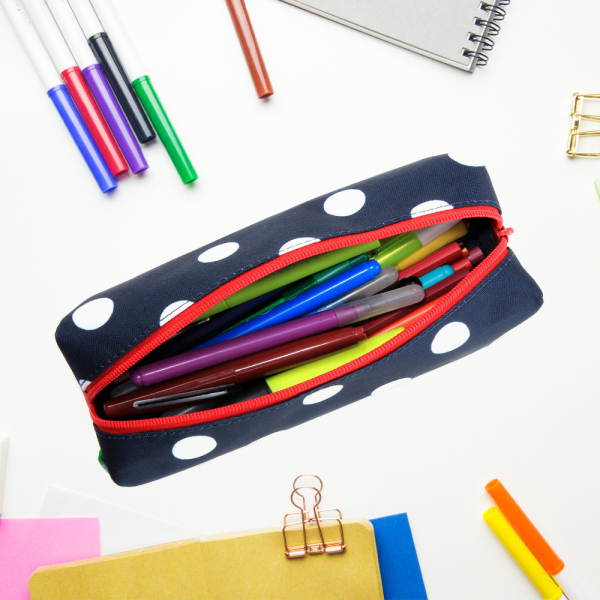 Trousse Tann's bleu marine à pois blanc