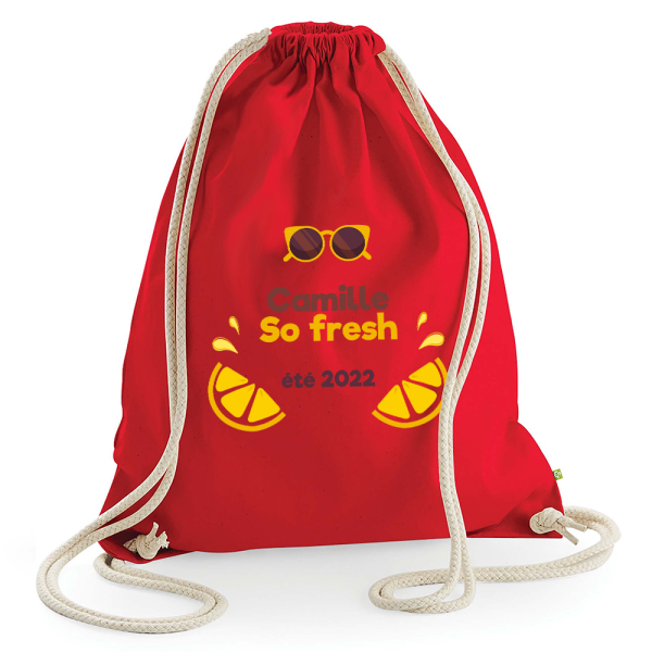sac de loisir rouge vacances à la mer blanc